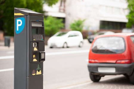 Parking meter on city street, space for text. modern deviceの写真素材