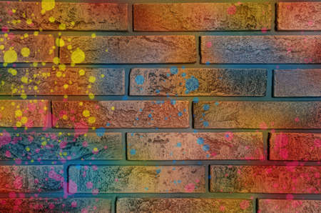 Abstract colorful graffiti drawn on brick wallの写真素材