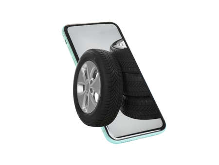 Online auto store, delivery service. Modern smartphone and car tires on white background