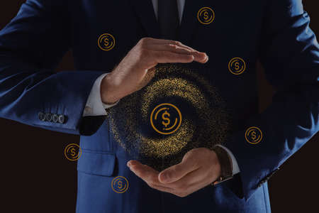 Man demonstrating virtual dollar sign on dark background, closeup