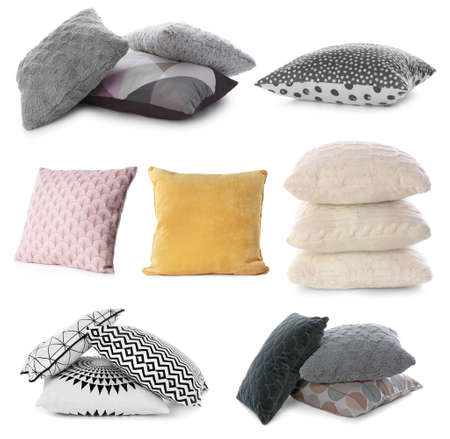 Set with different soft pillows on white backgroundの写真素材
