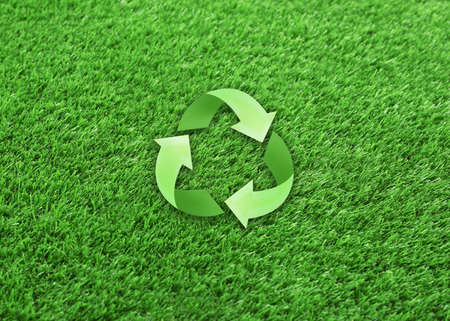 Illustration of recycling symbol and artificial grass carpetの写真素材