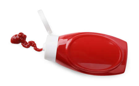 Bottle of tasty ketchup and stain isolated on white, top viewの写真素材
