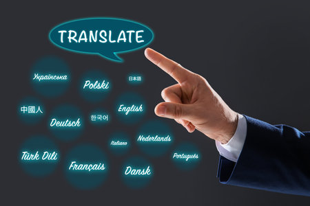 Translator pointing at virtual screen with names of different languages on gray background, closeupの写真素材