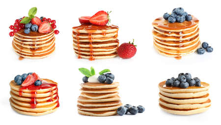Set with tasty pancakes on white backgroundの写真素材