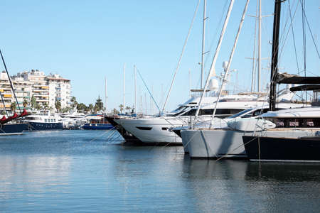 Picturesque view of port with modern boats on sunny day