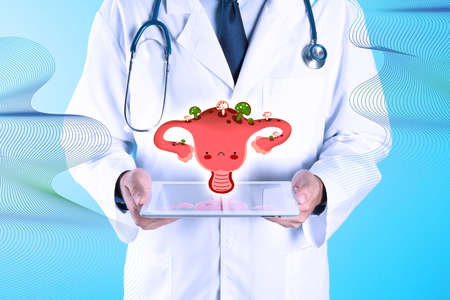 Doctor with tablet and virtual image of infected female reproductive system on turquoise background, closeup. Vaginal candidiasisの写真素材