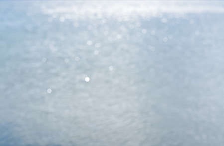 Blurred view of seascape on sunny day, bokeh effect