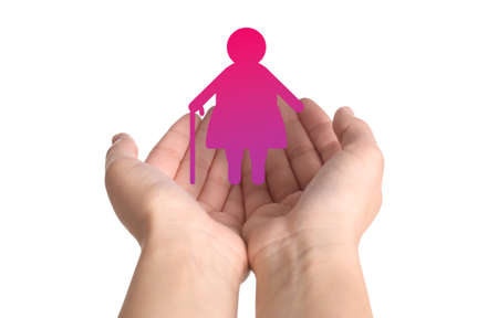 Woman demonstrating image of elderly lady on white background, closeup. Retirement conceptの写真素材