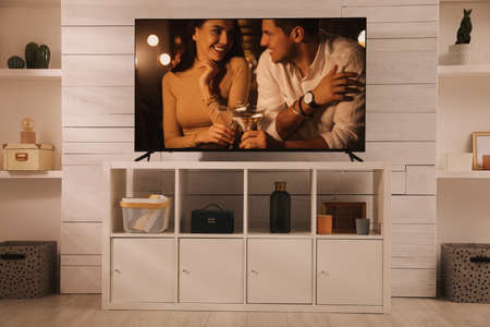 Scene of romantic movie on TV in room