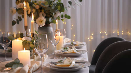 Festive table setting with beautiful decor indoors. banner designの写真素材