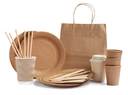 Set of disposable tableware on white background