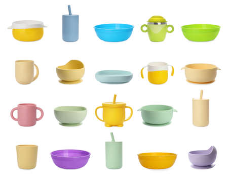 Set with colorful dishware on white background. Serving baby foodの写真素材
