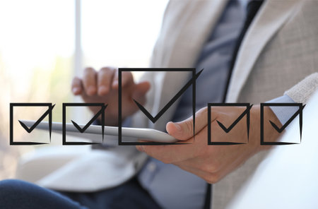 Illustration of check boxes with marks and man using tablet indoors, closeupの写真素材