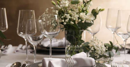 Stylish elegant table setting for festive dinner in restaurant. banner design
