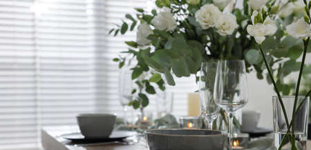 Festive table setting with beautiful tableware and decor indoors. banner designの写真素材