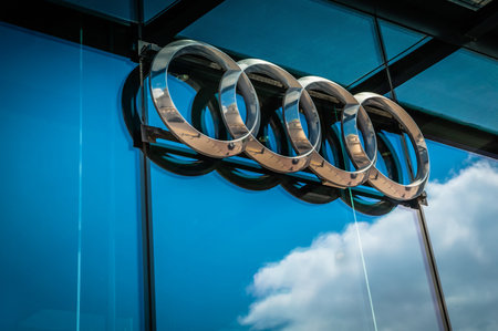 Warshaw, Poland - May 14, 2022: Glass facade of building with Audi logo, closeupのeditorial素材