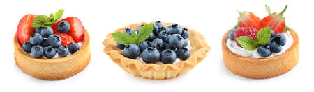 Set of tasty sweet tartlets with fresh berries on white background. banner design