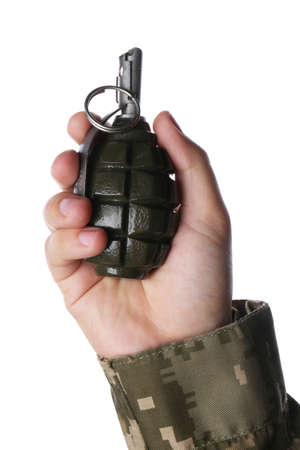 Soldier holding hand grenade on white background, closeupの写真素材