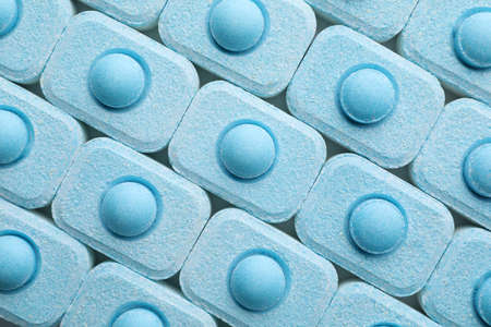 Many water softener tablets as background, top view