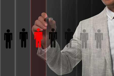 Deciding whether to dismiss employee. Man with marker near virtual screen, closeupの写真素材