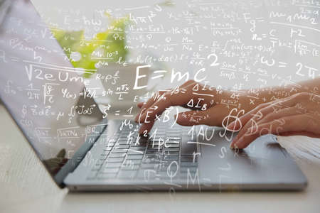 Science and education concept. Illustration of basic physics and mathematics formulas and woman...