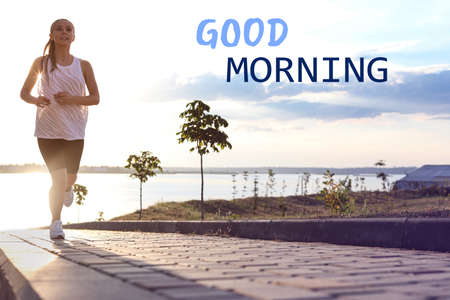 Good Morning! Young woman jogging near the river in the morning