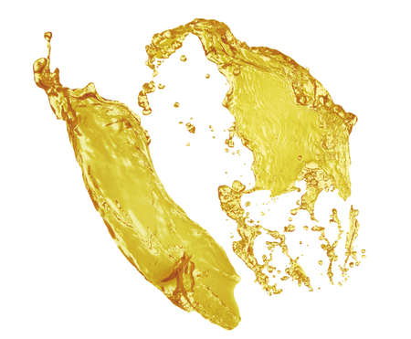 Natural organic cooking oil splashing on white backgroundの写真素材
