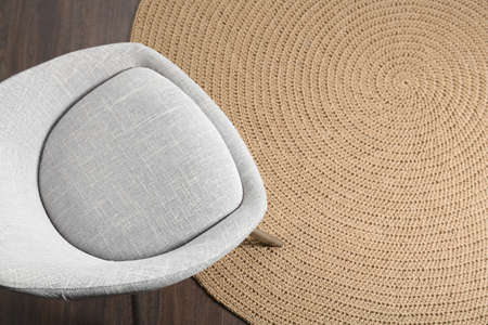 Stylish gray chair on floor, top view. Space for text