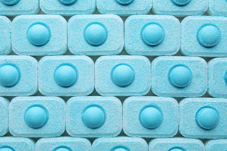 Many water softener tablets as background, top view