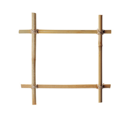 Empty frame made of bamboo sticks isolated on whiteの写真素材