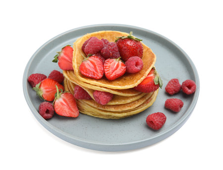Tasty pancakes with fresh berries on white backgroundの写真素材