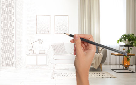 Woman drawing living room interior design, closeup. Combination of photo and sketchの写真素材