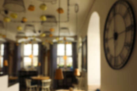 Blurred view of stylish modern cafe interior