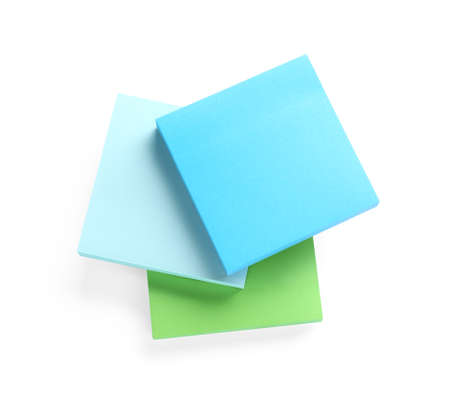 Blank colorful sticky notes on white background, top view