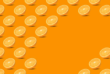 Tasty fresh ripe oranges on orange background, space for text