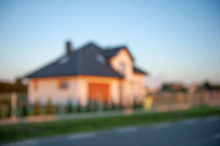 Blurred view of beautiful house in the eveningの写真素材