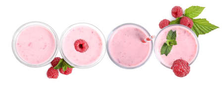 Set with tasty raspberry smoothie on white background, top view. banner designの写真素材