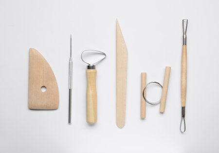 Set of clay modeling tools on white background, flat layの写真素材