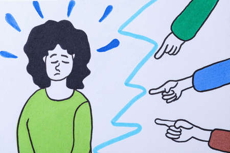 Drawing of people bullying sad woman, closeupの写真素材
