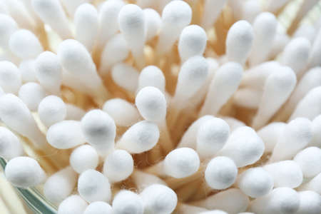 Many cotton buds in glass jar, closeupの写真素材