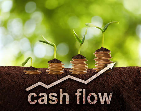 Cash flow concept. Illustration of upward arrow and stacked coins with green seedlings on ground