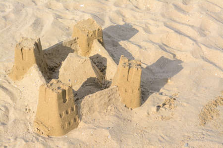 Beautiful sand castle on the beach. Space for textの写真素材