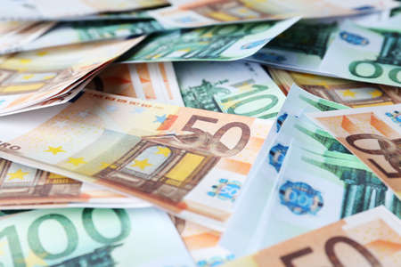 Different Euro banknotes as background, closeup. money exchange