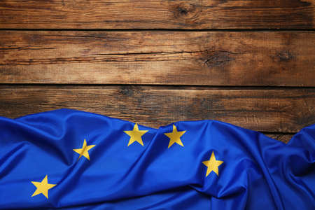 Flag of European Union on wooden background, top view. Space for textの写真素材