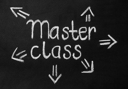 Words Master Class and arrows written with white chalk on blackboardの写真素材