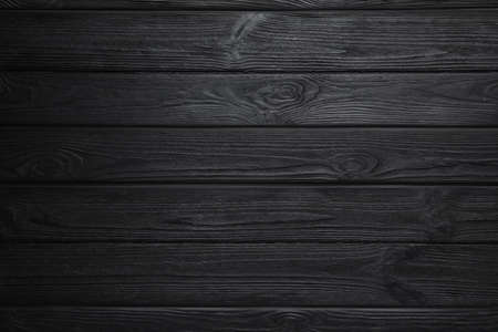Texture of black wooden surface as background, top viewの写真素材