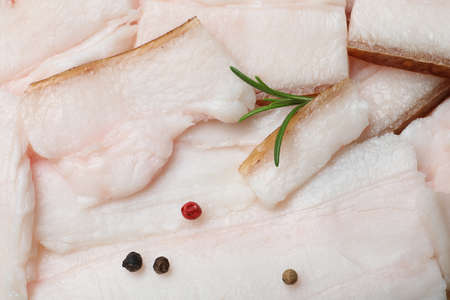 Tasty salt pork with peppercorns and rosemary, top viewの写真素材