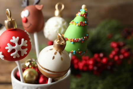 Delicious Christmas themed cake pops on blurred background, closeupの写真素材