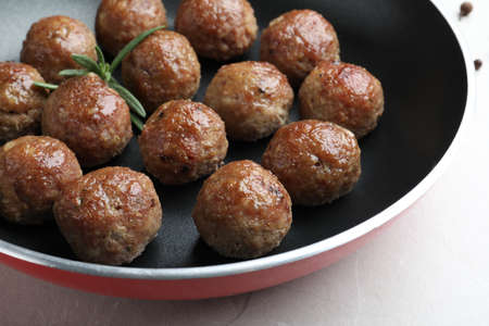 Tasty cooked meatballs on light gray marble table, closeupの写真素材